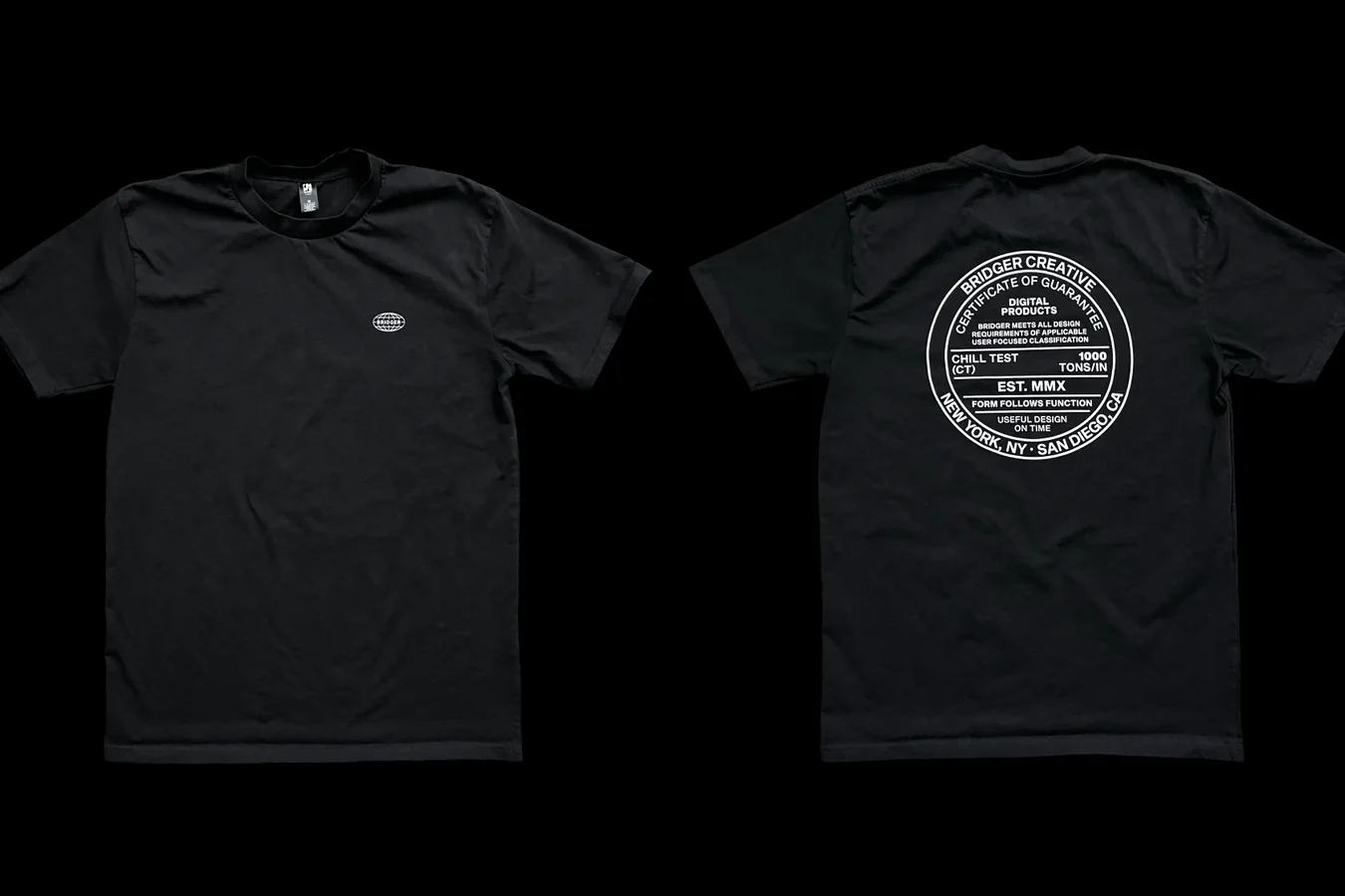 Front and back of a black t-shirt on black, a small oval logo on the chest and a large circular seal on the back